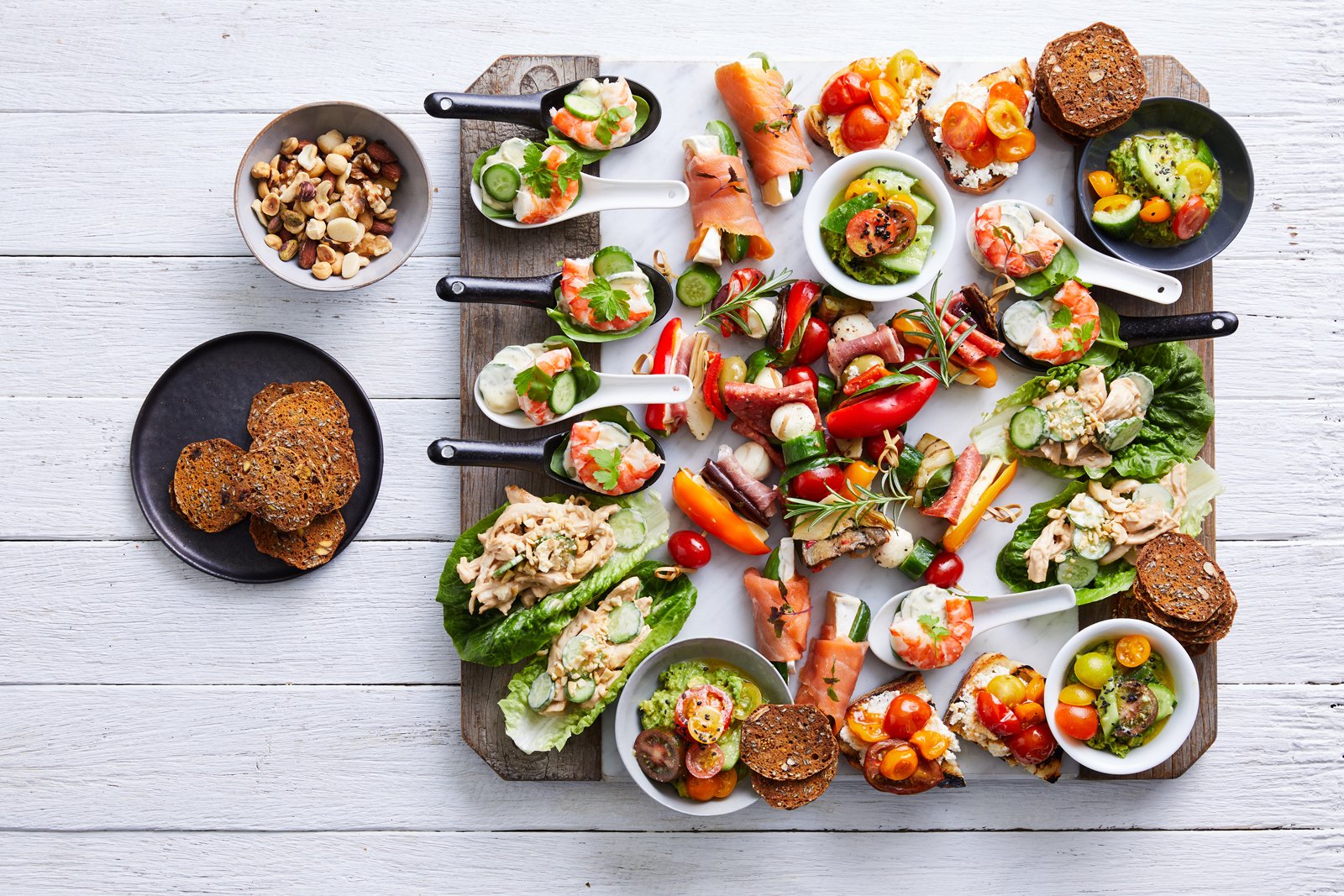 Grazing board recipe with tomatoes, baby cucumbers, capsicums by Perfection Fresh 