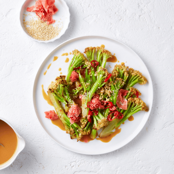Stir-Fry Cauli-blossom with ginger and chilli on a plate. 