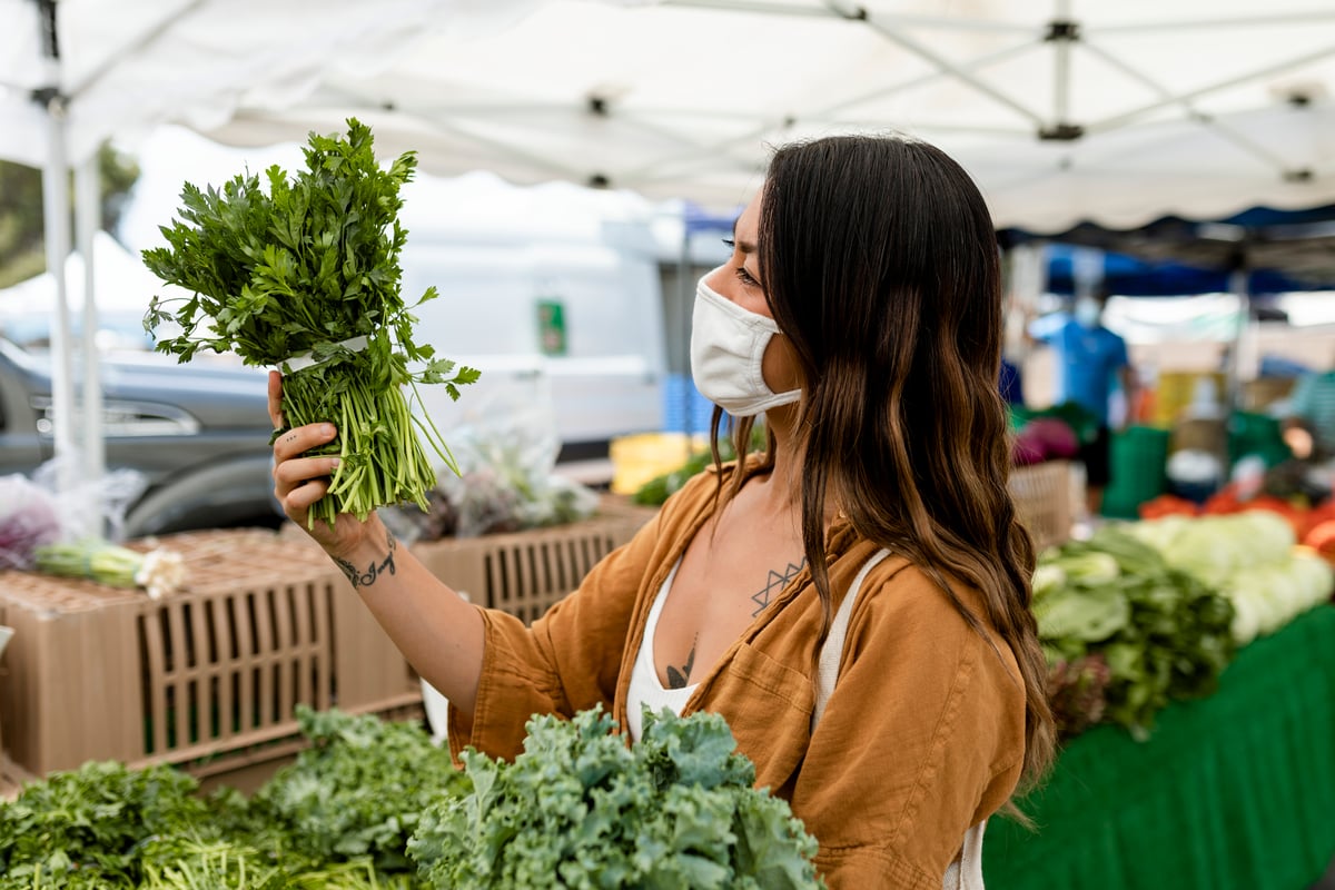 woman-shopping-for-vegetable-buying-at-fresh-mark-2022-12-16-01-03-22-utc