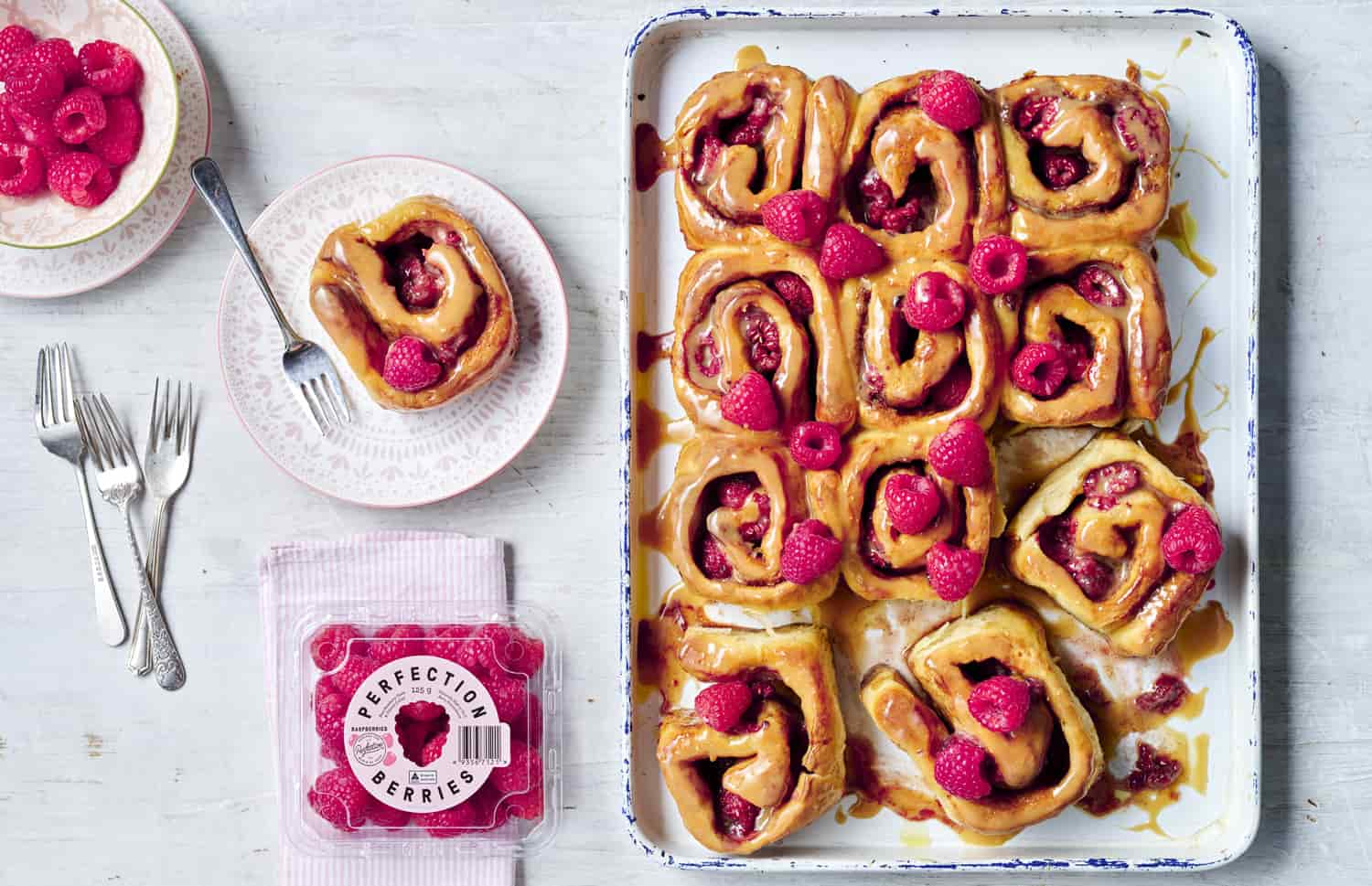 Fresh Raspberry Scrolls With Caramilk Glaze